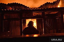 Mariupol. Looting and fire in a hastily  abandoned military military unit. Ukraine, fire,  evening, night, fire